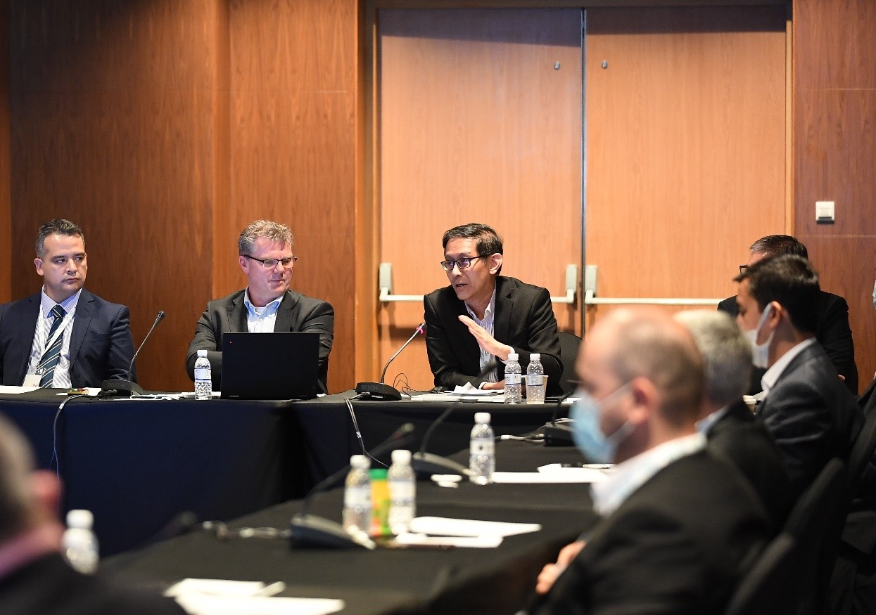 3rd from left Dr Victor Khoo in a discussion at a UNGGIM meeting hosted by SLA in Singapore in May 2022.jpg